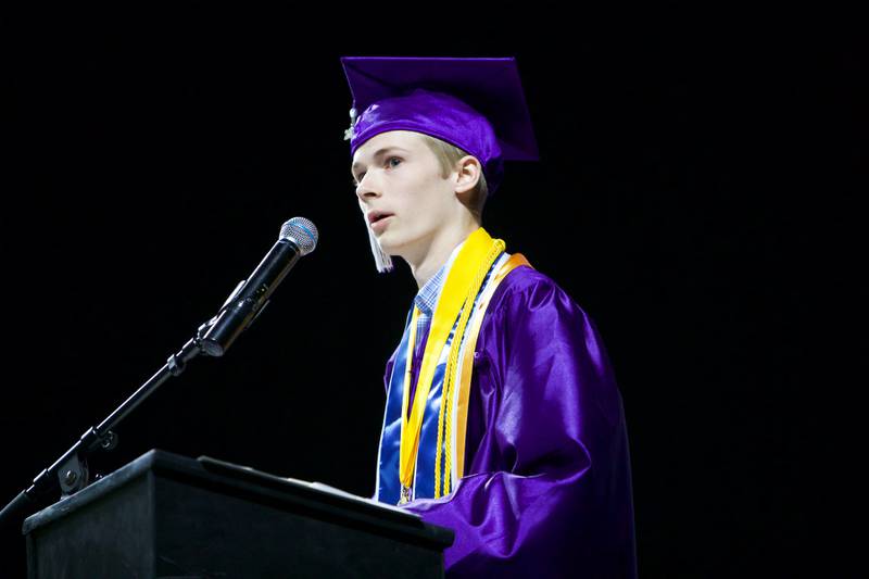 Valedictorian John Calvin addresses the class at Hampshire High School graduation ceremony on May 21, 2022, at the NOW Arena in Hoffman Estates.