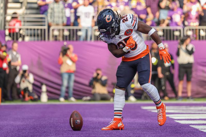 Chicago Bears running back Kyle Monangai (25) celebrates after running in a touchdown during the first half of an NFL football game against the Minnesota Vikings, Sunday, Nov. 16, 2025, in Minneapolis. (AP Photo/Matt Krohn)