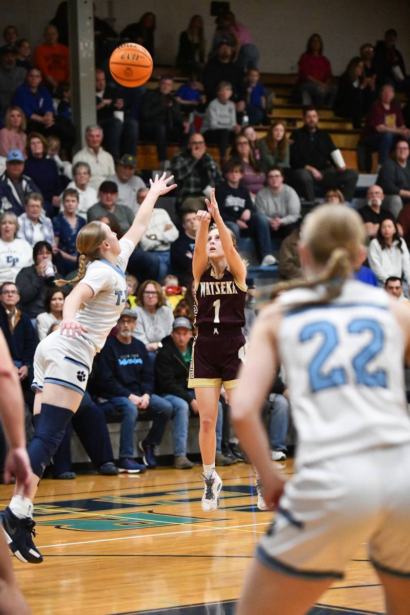 Watseka-Milford's Kami Muehling attempts a 3-pointer over Cissna Park's Addison Lucht on Monday, Feb. 10, 2025, during Cissna Park's 61-40 victory.
