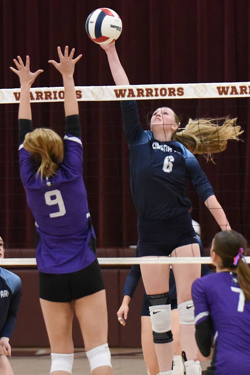Cissna Park's Marina Day, right, looks to place a hit over Lexington's Jillian Reimer during the IHSA Class 1A Watseka Sectional championship Thursday, Nov. 6, 2025.