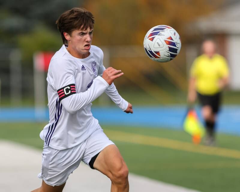 Downers Grove North's Will Beatty (4) advances the ball during Class 3A Lyons Regional final soccer match.  Oct 21, 2023.