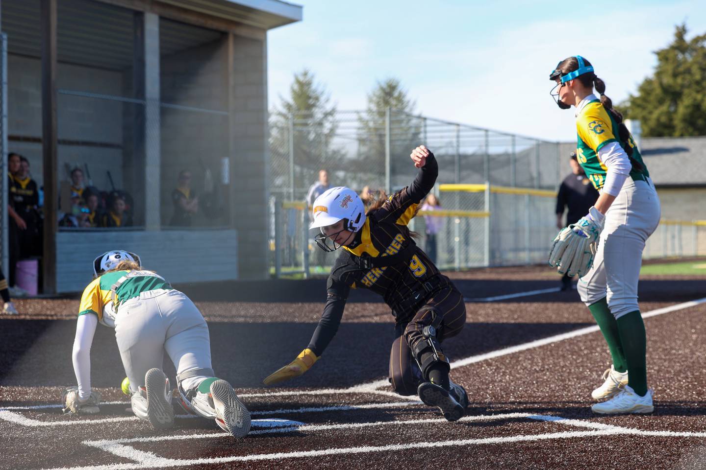 Herscher's Keira Ahramovich evades Coal City catcher Khloe Picard recovers the ball during Coal City's 14-10 victory over Herscher on Monday, April 20, 2026.