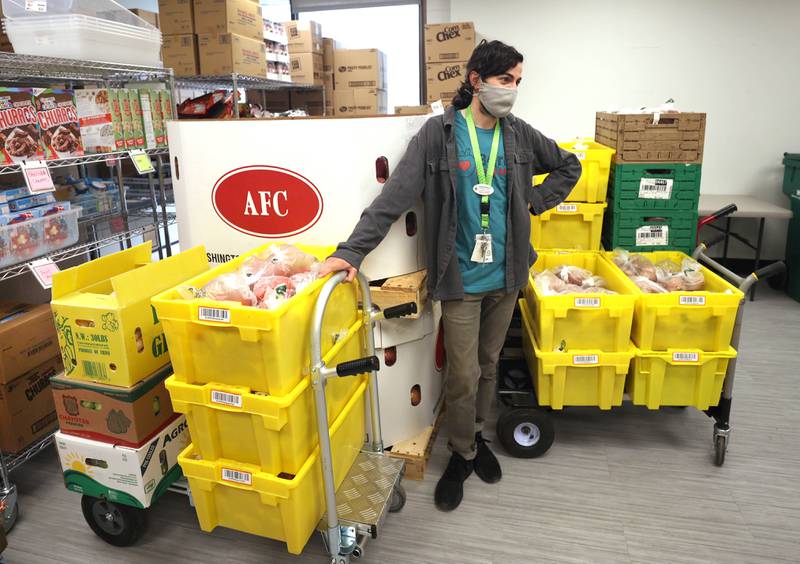 Frankie DiCiaccio, operations manager of Barb Food Mart, talks Thursday, April 7, 2022, about the quality and variety of produce available at the facility in DeKalb. Barb Food Mart is a food pantry serving those in need that have a student enrolled in the DeKalb School District.