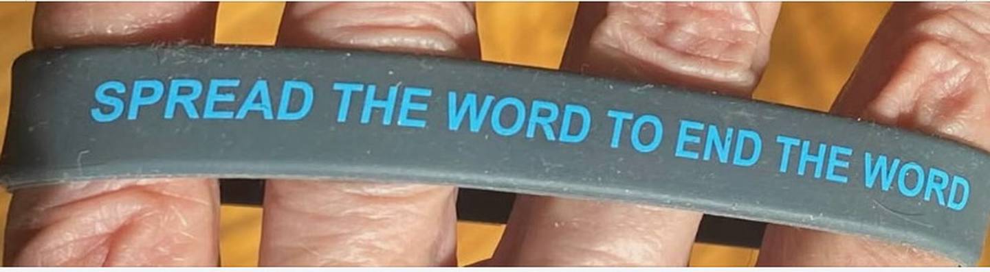 Roxanne Remitz wears this bracelet to reflect the Special Olympics campaign to end the use of the r-word as a slur against people with disabilities.