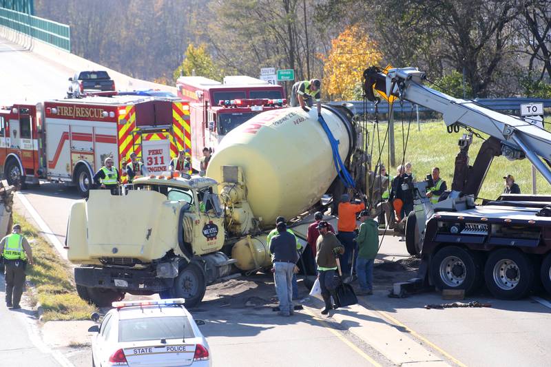 Emergency crews responded Wednesday, Nov. 15, 2023, to an overturned cement truck on Route 251 near the U.S. 6 interchange in Peru.