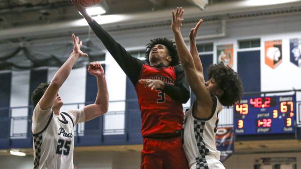Photos: Bolingbrook vs. Oswego East boys basketball