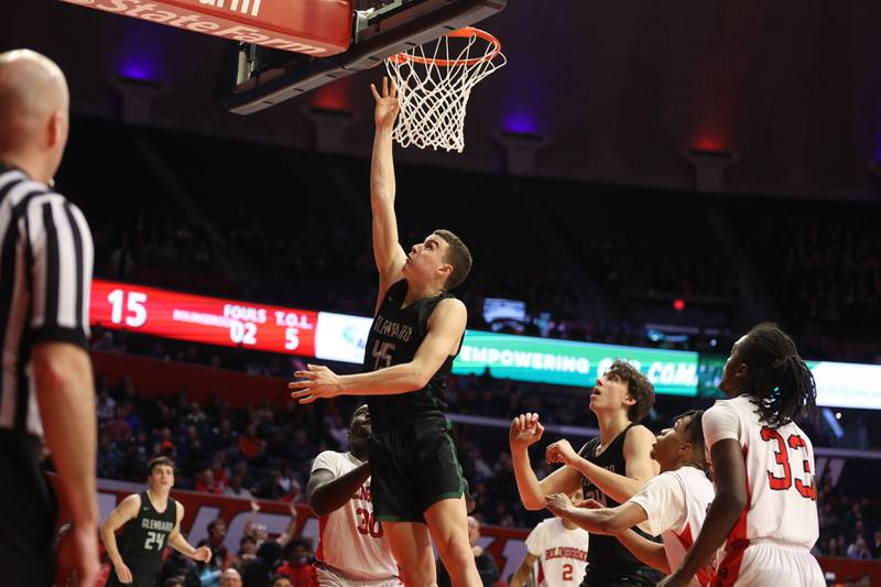 Glenbard West’sRyan Renfro puts in a shot against Bolingbrook in the Class 4A semifinal at State Farm Center in Champaign. Friday, Mar. 11, 2022, in Champaign.