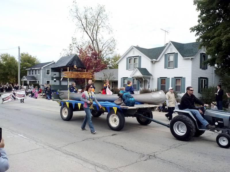 Cortland Cub Scout Pack 134 had a float with an outdoors theme, complete with canoe, in the Cortland Fall Festival Parade on Oct. 12.