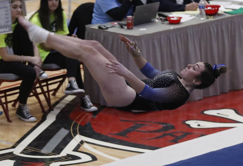 Geneva's Sadie Karlson competes in the preliminary round of the floor exercise Friday, Feb. 17, 2023, during the IHSA Girls State Final Gymnastics Meet at Palatine High School.