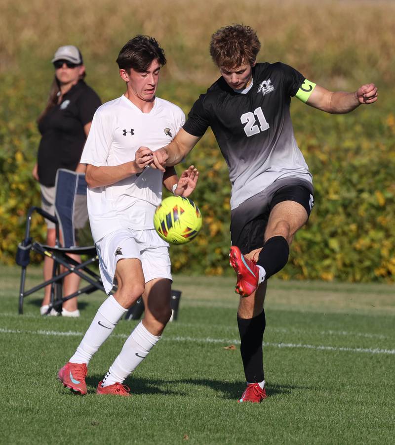 Kaneland's Jackson Boryc kicks the ball away from Sycamore's Leo Padilla during their game Wednesday, Sept. 16, 2025, at Kaneland High School in Maple Park.