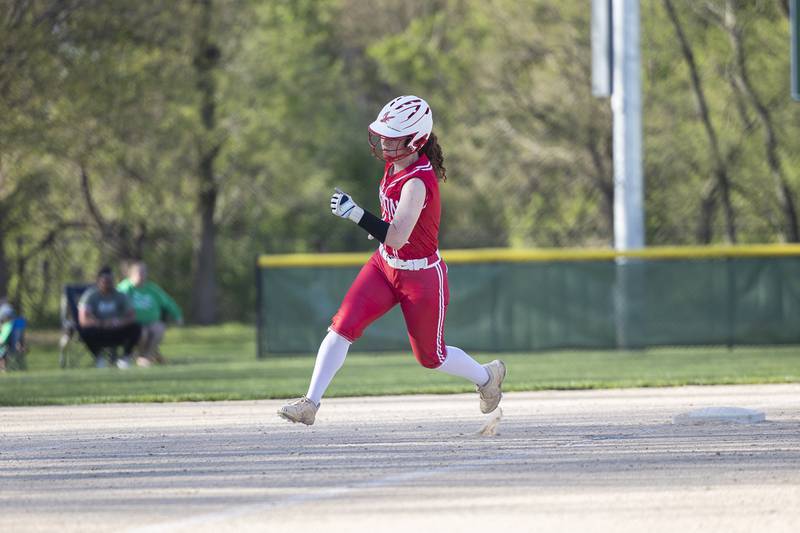 Oregon’s Ashlee Mundell rounds third to score against Rock Falls Wednesday, April 22, 2026.