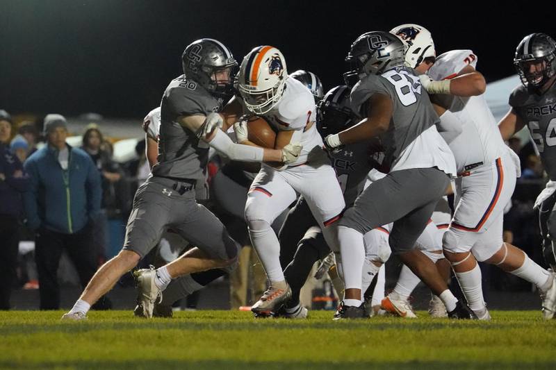 Oswego’s Lucas Andersen (2) scores a touchdown on a carrie against Oswego East during a football game at Oswego East High School on Friday, October 25, 2024.