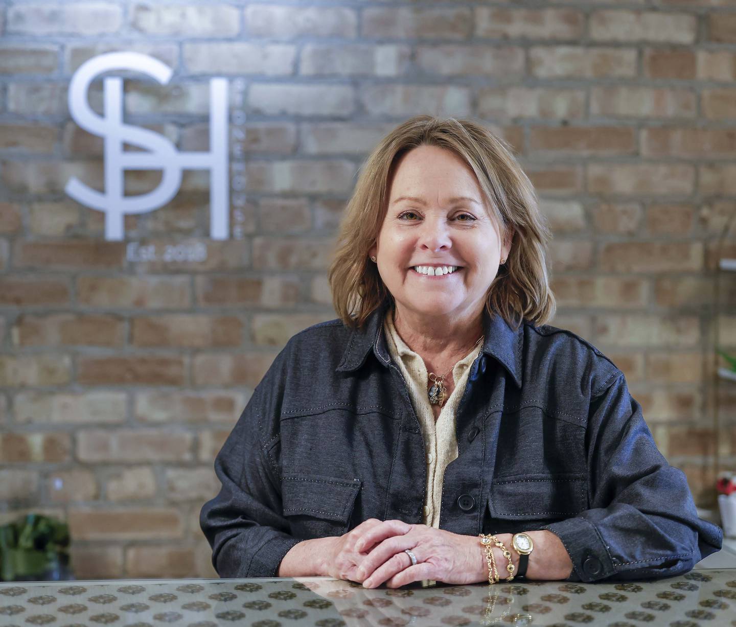 “We’re keeping them both going, and customers know that,” Fran Rouse says of her Stonehouse stores in Town Square Wheaton and downtown at 126 N. Hale St.