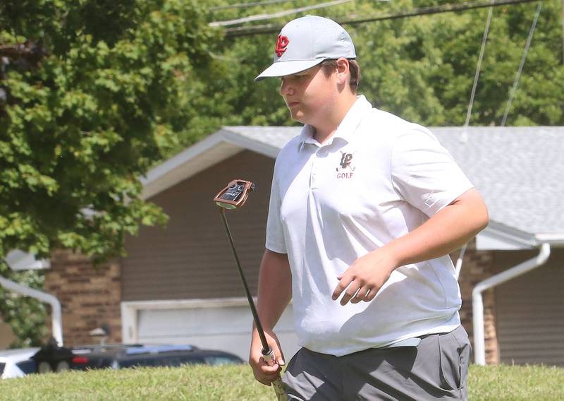 L-P's Grady Sandor, walks back to his cart after finishing the one hole during the Streator Bulldog Invitational on Monday, Aug. 25, 2025 at Eastwood Golf Course in Streator.