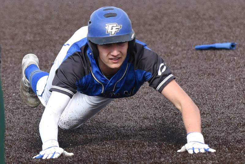 Central's Derek Meier dives into third base with a triple during the Class 2A Herscher Regional semifinals against Bishop McNamara Thursday, May 22, 2025.