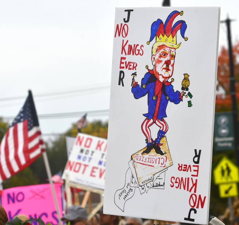 There were a variety of signs carried by demonstrators on Saturday, Oct. 18, 2025 at the No Kings rally on the Ogle County Courthouse square in Oregon, Illinois to protest actions and decisions by President Donald Trump and his administration.