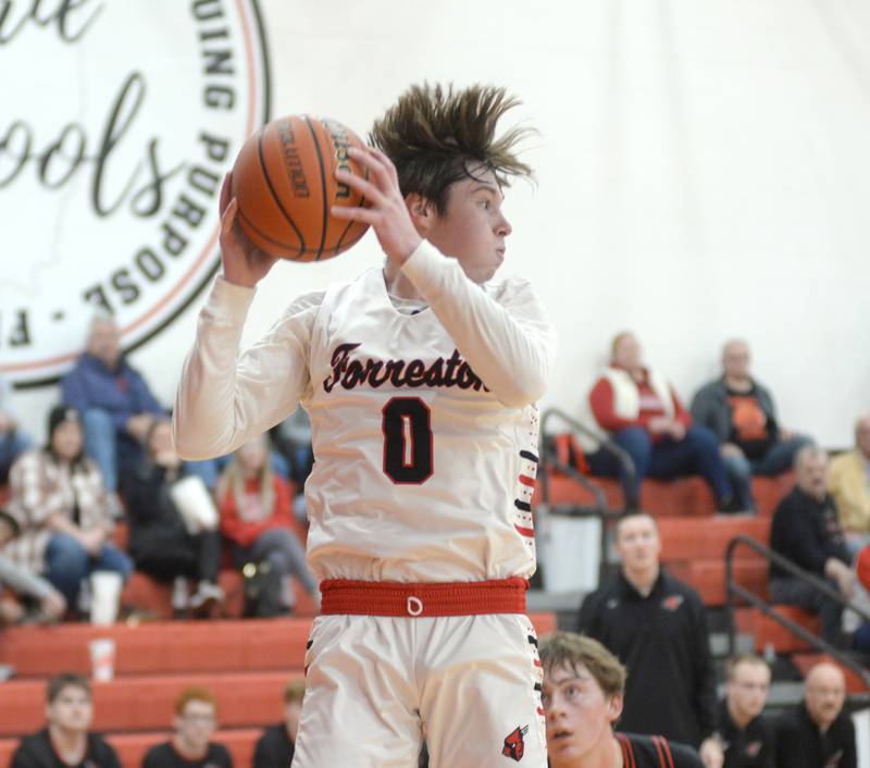 Forreston's Brendan Greenfield rebounds against Erie-Prophetstown during a Saturday, Dec. 30, 2023 game at the Warkins Memorial Tournament at Erie High School.