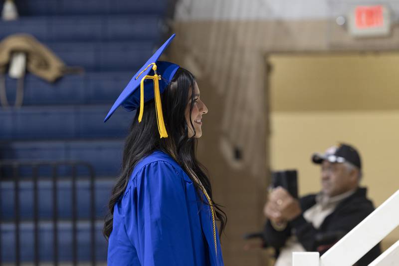 Mia Trujillo waits to collect her diploma Wednesday, May 21, 2025, during Newman High School’s 2025 commencement.