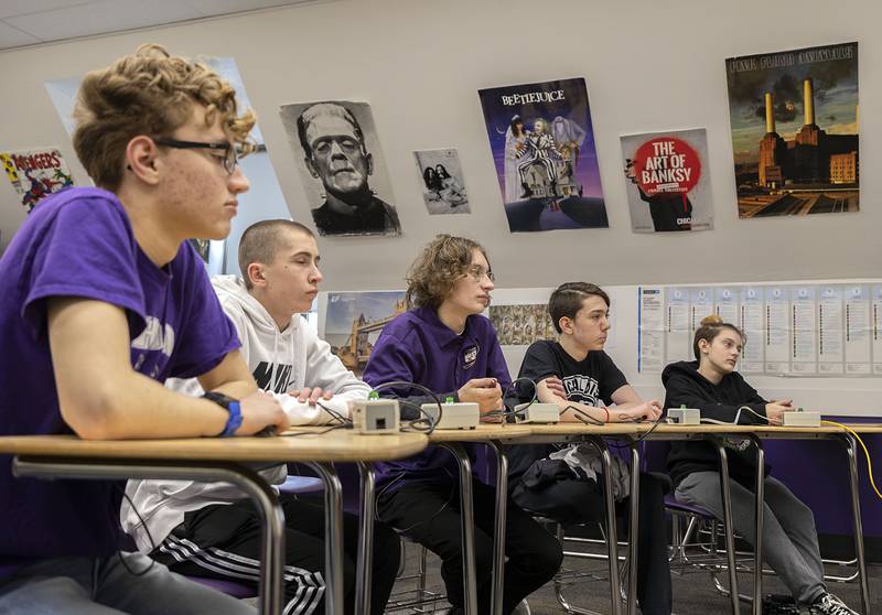 Dixon team members Hayden Fulton (left), Aaron Conderman, Thomas Stauter, Christopher Wadsworth and Oliver Payne practice for scholastic bowl regionals Thursday, March 2, 2023 at Dixon High School.