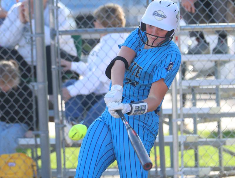 Marquette's Kelsey Cuchra makes contact with the ball on Tuesday, April 23, 2026 at June Cross Field in Ottawa.