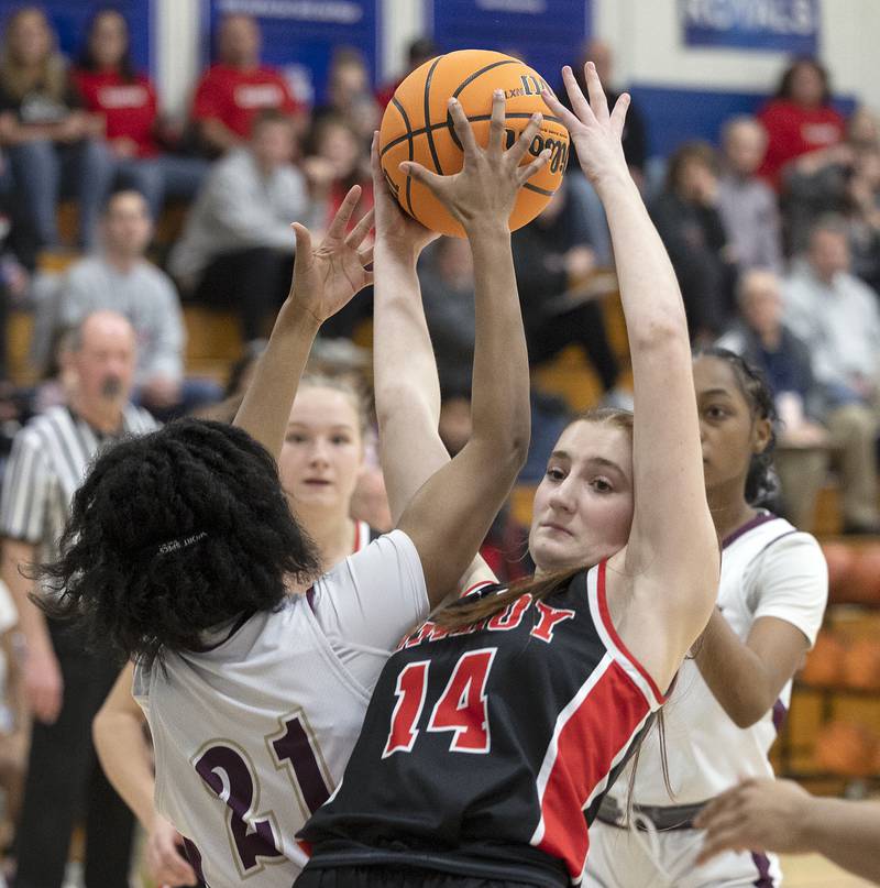 Amboy’s Jillian Anderson and Morgan Park Academy’s Tiara Williams fight for the ball Tuesday, Feb. 25, 2025, in the Class 1A Sectional semifinal at Hinckley-Big Rock.