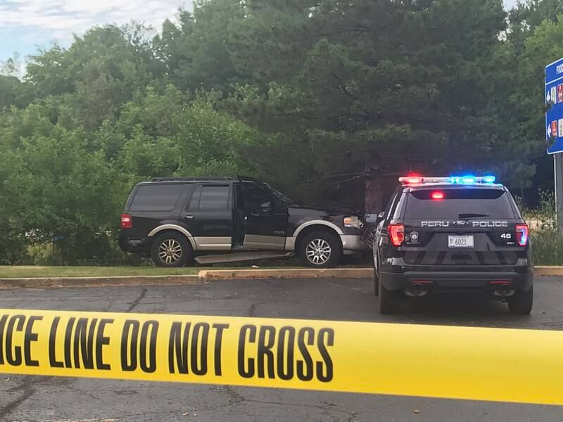 Peru police and first responders were dispatched about 5:45 p.m. Friday, July 1, 2022, to the parking area between La Quinta and Fairfield Inn hotels, where a black SUV struck a tree following a police pursuit. Details are emerging, but witness reports suggested a chase in the area of Route 251 and Interstate 80. Several occupants emerged from the crashed SUV and fled on foot. Shaw Media is seeking more information on possible apprehensions and charges.