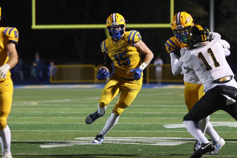 Lyons Township’s Tucker King cuts upfield after a catch against Joliet West in the first round of the playoffs on Friday, Nov. 1, 2024 in La Grange.