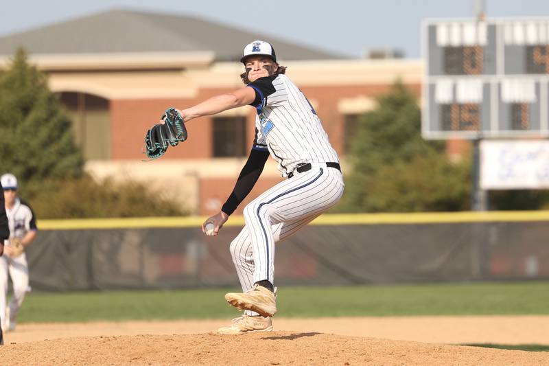 Lincoln-Way East’s Zach Kwasny delivers a pitch against Lincoln-Way West on Monday, April 24, 2023 in Frankfort.