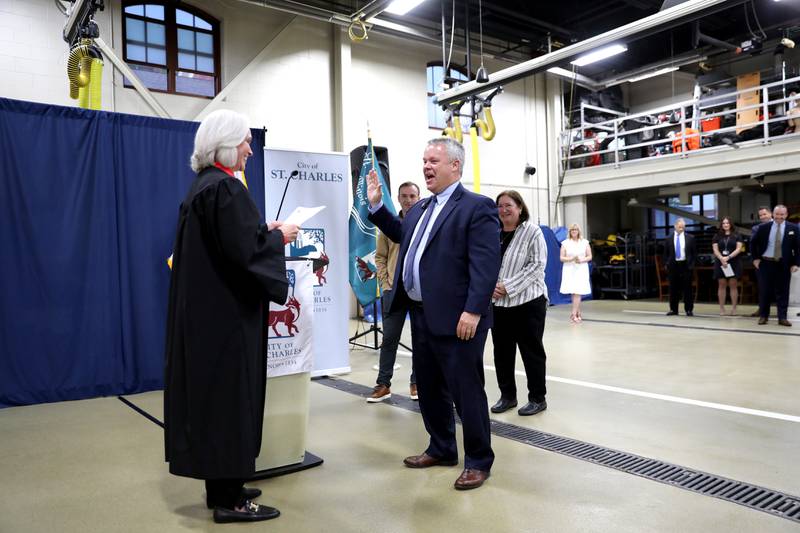 St. Charles Mayor Clint Hull is sworn in surrounded by his family by Circuit Court Judge Susan Clancy Boles on Monday, May 5, 2025 at the St. Charles Fire Department.