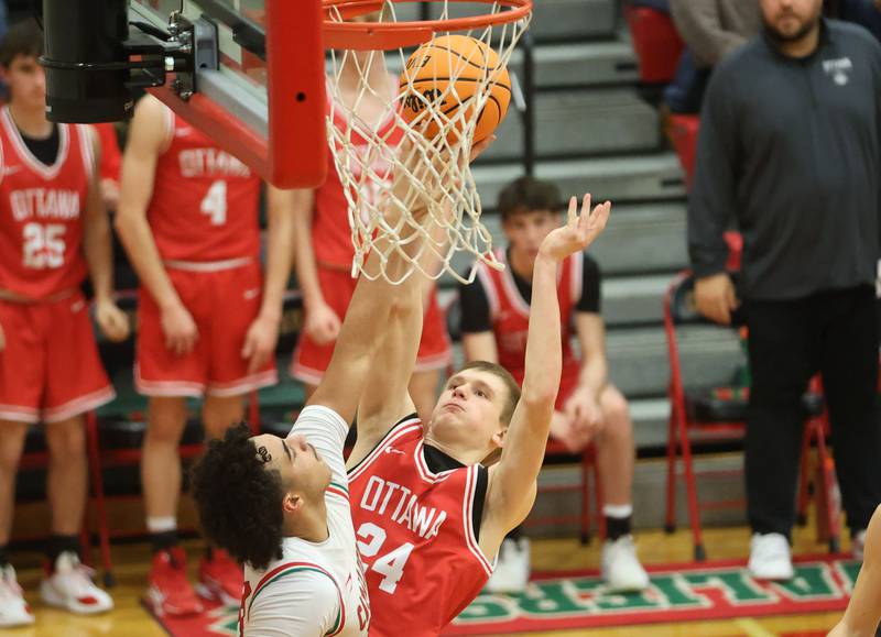 Ottawa's George Shumway has his shot tipped by L-P's Marion Persich under the hoop on Friday, Jan. 9, 2026 in Sellett Gymnasium at L-P High School.