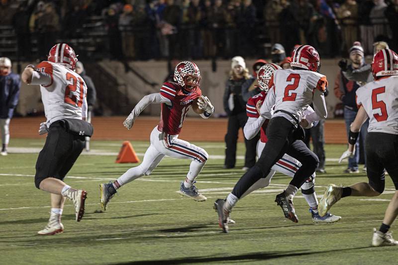 West Central’s Kaiden Droste picks up big yards Friday, Nov. 18, 2022 in the 8-man championship football game against Amboy.