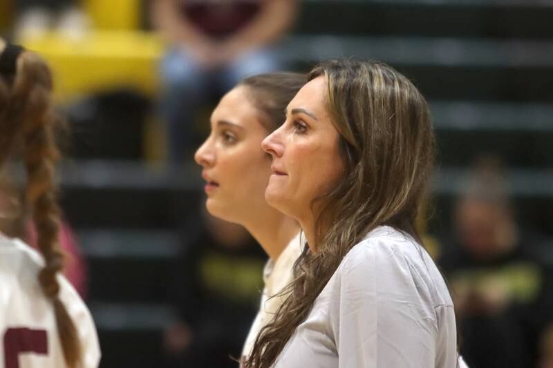 Prairie Ridge’s Head Coach Hilary Agnello and her daughter Maizy prepare to face Woodstock North in IHSA Class 3A Sectional semifinal volleyball action on Tuesday, Nov. 5, 2024, at  Crystal Lake South High School  in Crystal Lake.