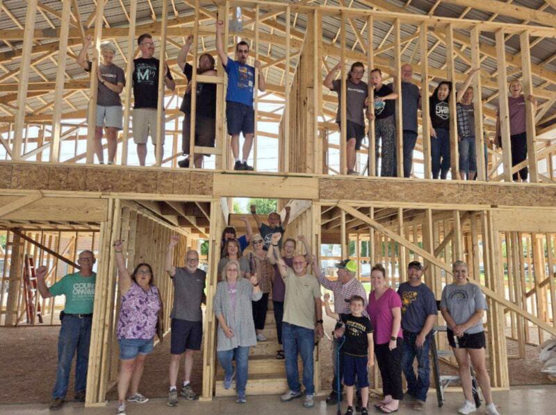 Leaders, volunteers and youth visit the future home of Second Story Teen Center on Saturday, July 20, 2024, in downtown Princeton.