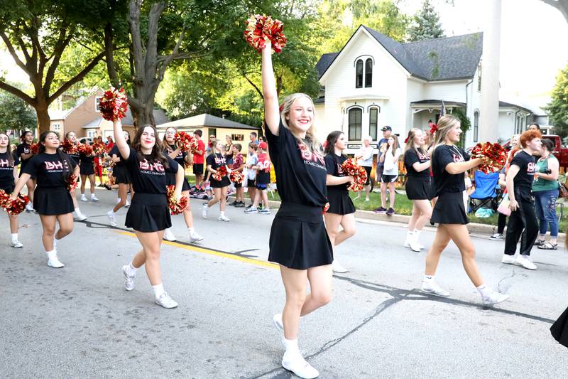 Cheerleaders perform during the Batavia High School Homecoming parade on Wilson Street on Wednesday, Sept. 14, 2022.