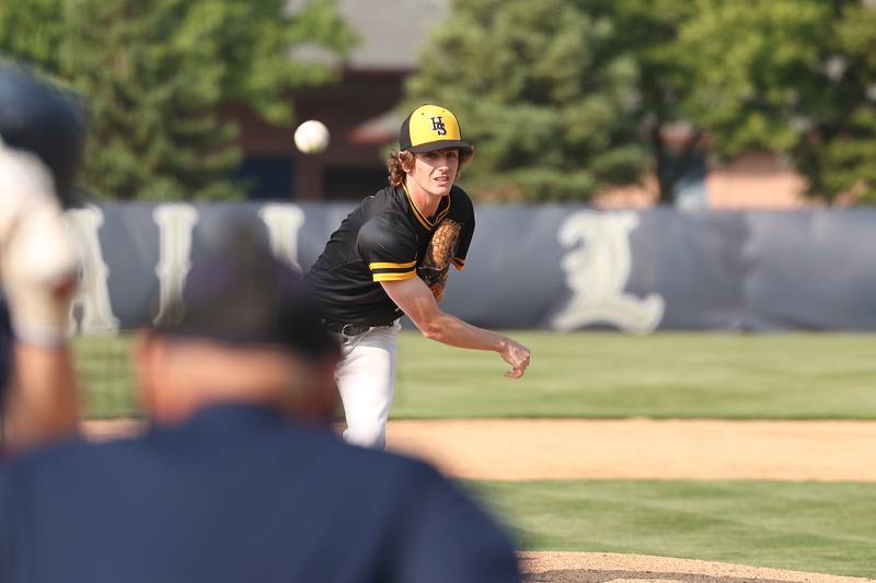 Hinsdale South’s Sam Harmon delivers a pitch against Lemont on Wednesday, May 24, 2023, in Lemont.