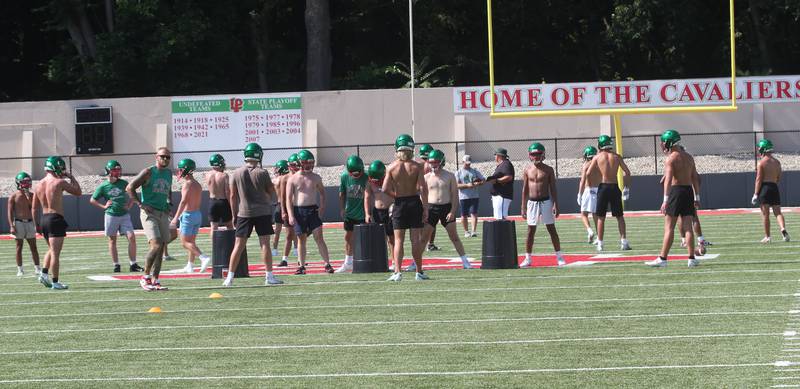 Members of the L-P Cavaliers football team run drills during the first day of football practice on Monday, Aug. 11, 2025 at Howard Fellows Stadium.