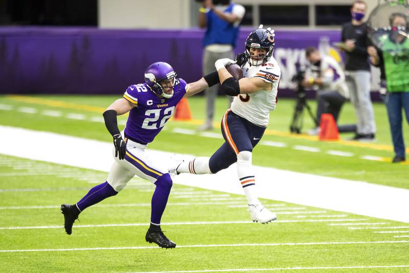 Chicago Bears tight end Cole Kmet (85) catches a pass against Minnesota Vikings strong safety Harrison Smith (22) in the first quarter Sunday, Dec. 20, 2020, in Minneapolis.