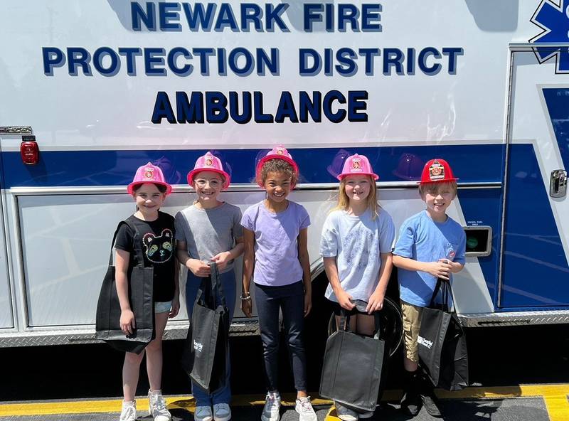 Newark Grade School participated in Camp 911 on May 9, a program begun in 2015 by retired Newark School District nurse Karen Sapsford. Firefighters and EMTs from the Newark Fire Department along with deputies from the Kendall County Sheriff's Office brought their equipment to show students, while nurses from Rush Copley Medical Center in Yorkville taught students first aid.