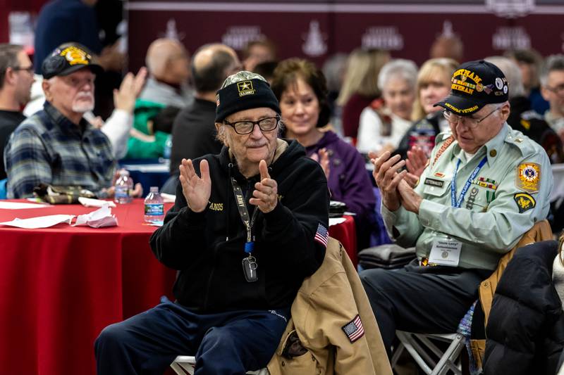 Attendees applaud as speakers address the crowd during the dinner portion of Lockport Township High School’s 11th Annual Veteran Night Celebration on Jan. 23, 2026.
