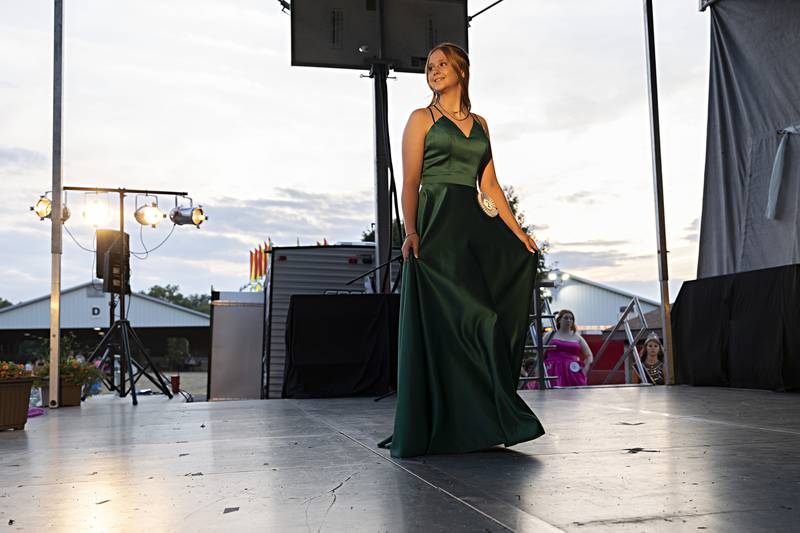 Cylee Kirchner displays her evening gown Wednesday August 2, 2023 at the Junior Miss Ogle County pageant.