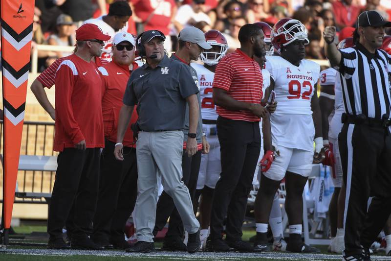 Houston head coach Dana Holgorsen on the sideline against Texas Tech during the second half of an NCAA college football game Saturday, Sept. 10, 2022, in Lubbock, Texas. (AP Photo/Justin Rex)