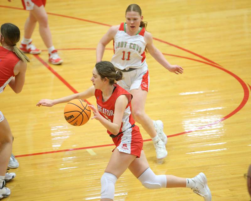 Streator's Audrey Arambula runs into the lane past L-P's Elizabeth Sines on Tuesday, Jan. 28, 2025 in Sellett Gymnasium at L-P High School.