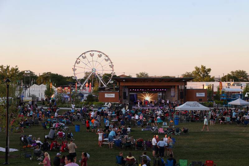 Attendees fill the lawn at The Grove during the 50th Bourbonnais Friendship Festival at The Grove on Saturday, June 28, 2025.