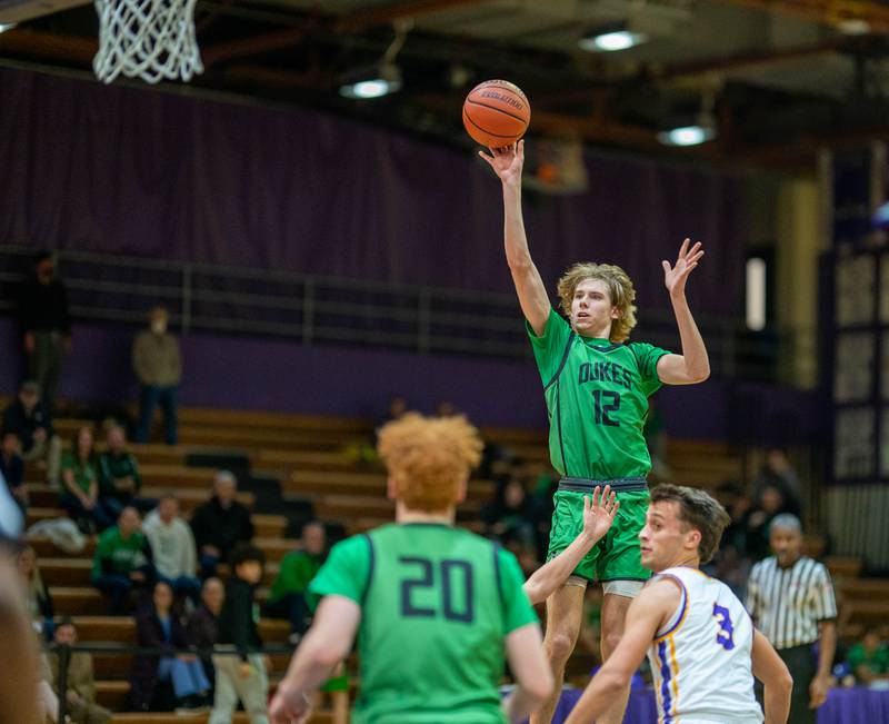 York's Brendan Molis (12) shoots the ball in the post against Downers Grove North during a basketball game at Downers Grove North High School on Friday, Dec 9, 2022.