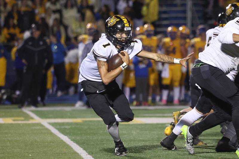 Joliet West’s Antoine Brooks rushes on the quarterback keeper against Lyons Township in the first round of the playoffs on Friday, Nov. 1, 2024 in La Grange.