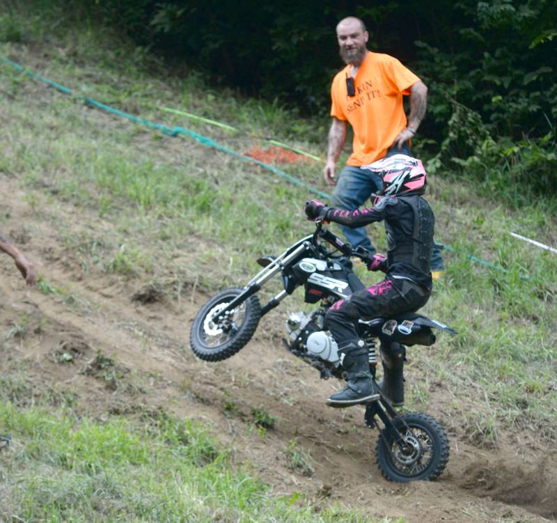 Riley Prebula, 10, of Polo, tries to climb the hill at the Rock River Riders Motorcycle Club's hillclimb on Sunday, Aug. 3, 2025. Prebula won two trophies in the youth division.
