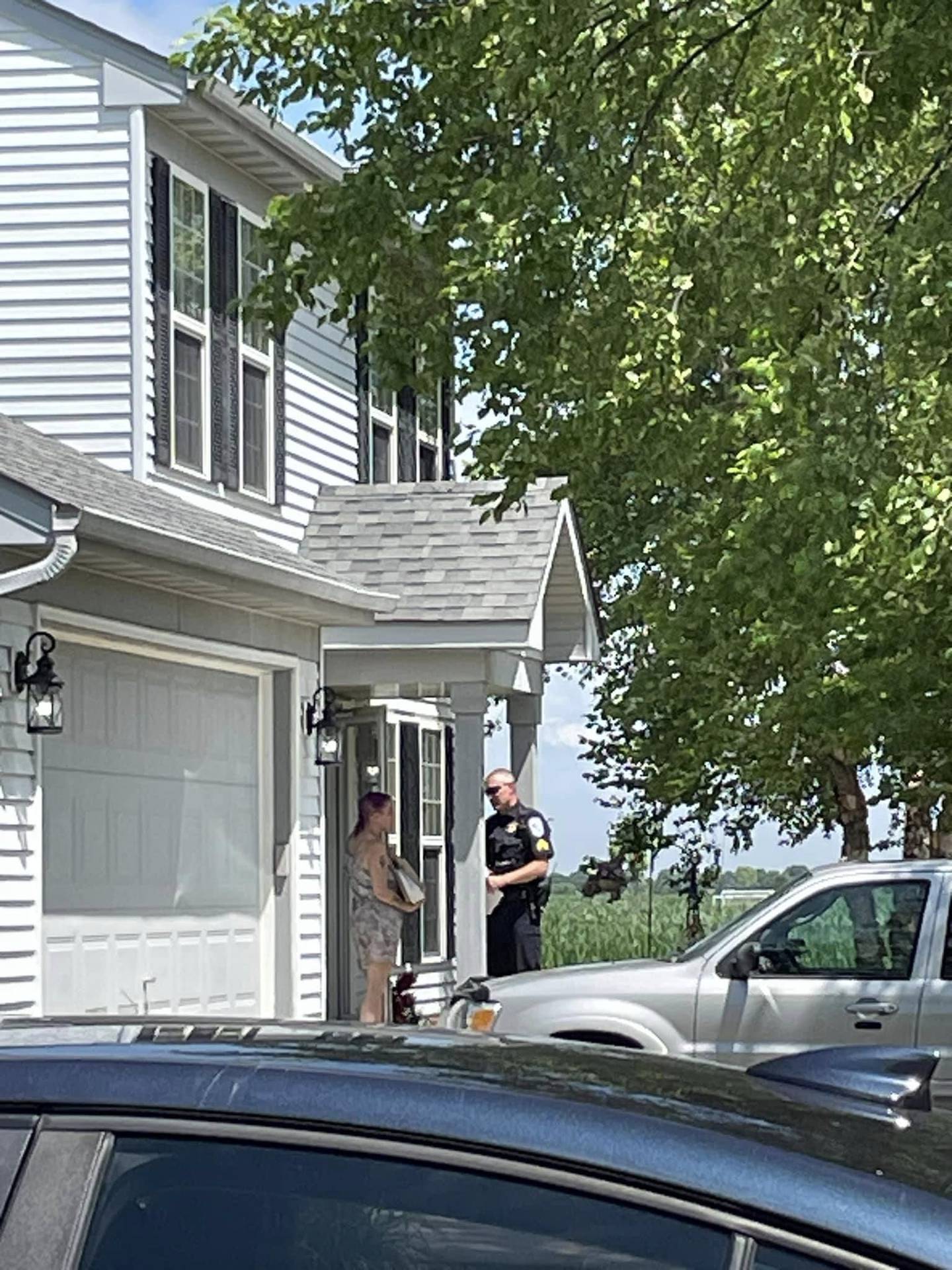 Sandwich Sgt. Jeremy Eisenberg talked to residents in Fairwinds subdivision last month as part of the department’s new Walk & Talk initiative.