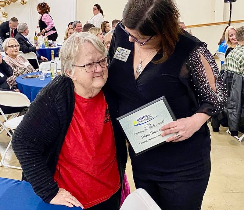 An emotional Dilene Simmons (left), embraces Krissy Johnson, executive director of the Genoa Area Chamber of Commerce, after being named the 2024 Community Pride Award recipient on Thursday, Feb. 13, 2025, at the chamber's 68th Annual Meeting and Awards Dinner at Custom Aluminum Products, 312 Eureka St., Genoa.
