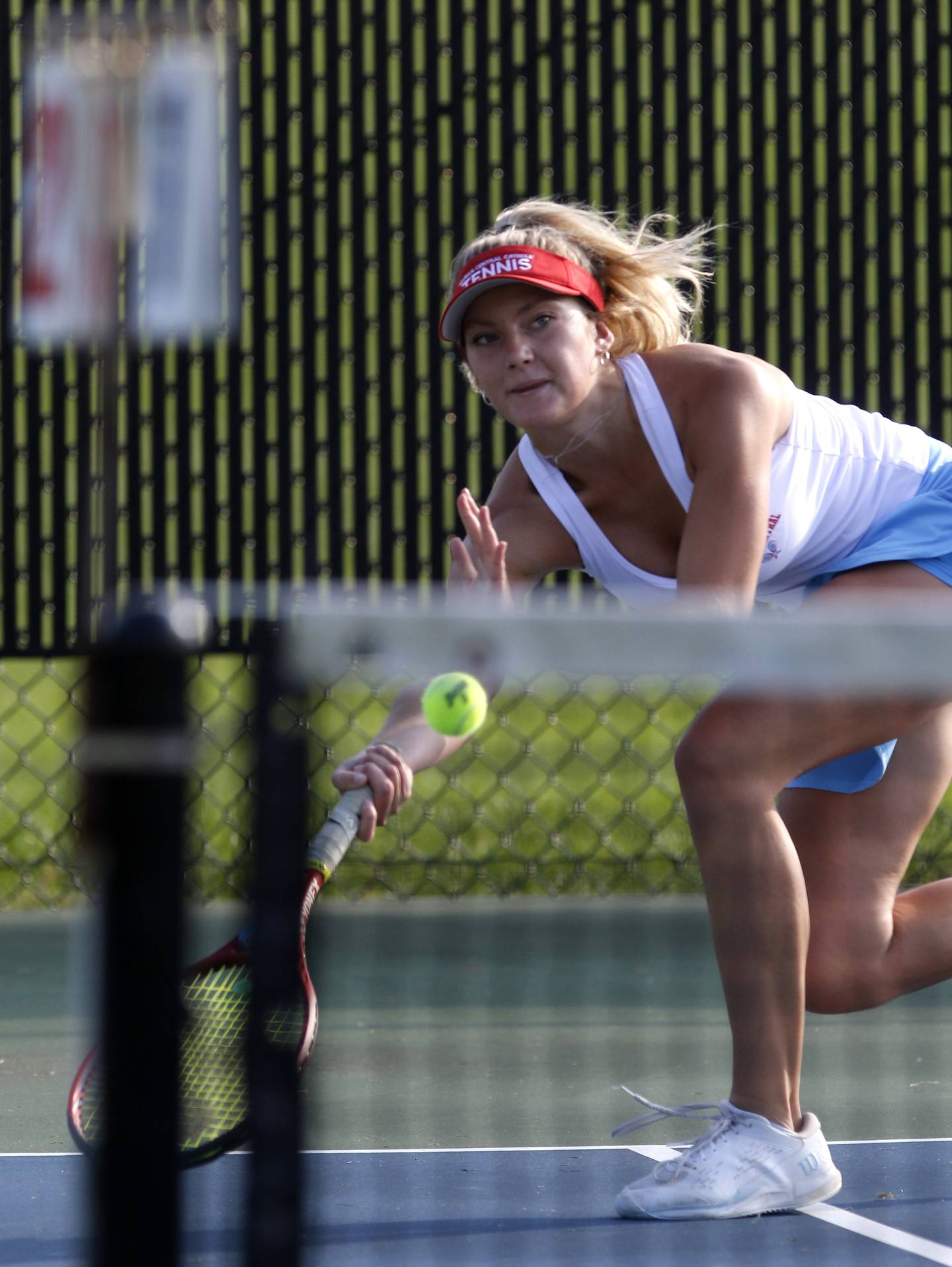 Marian Central’s Madison Kenyon returns the ball  during a non-conference tennis match on Monday, Sept. 25, 2023, at Crystal Lake Central High School.