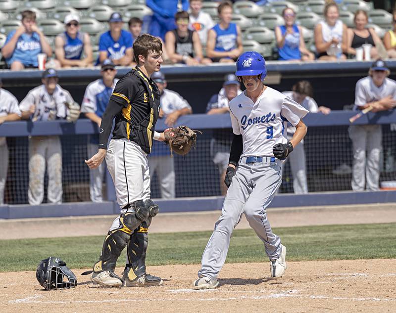 Newman’s Joe Oswalt crosses the plate to take the lead against Goreville Saturday, June 3, 2023 during the IHSA class 1A third place baseball game.